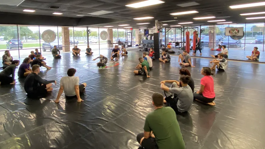 Cobra BJJ families training together at the Plano academy