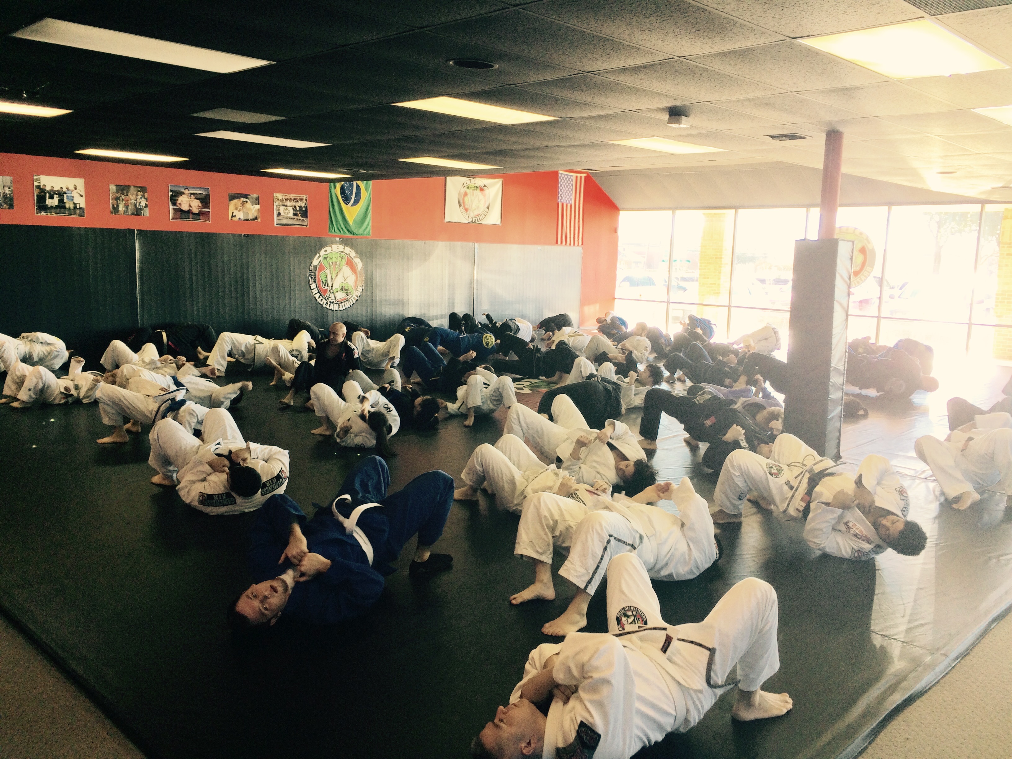 Rolling rounds on the mats at Cobra BJJ